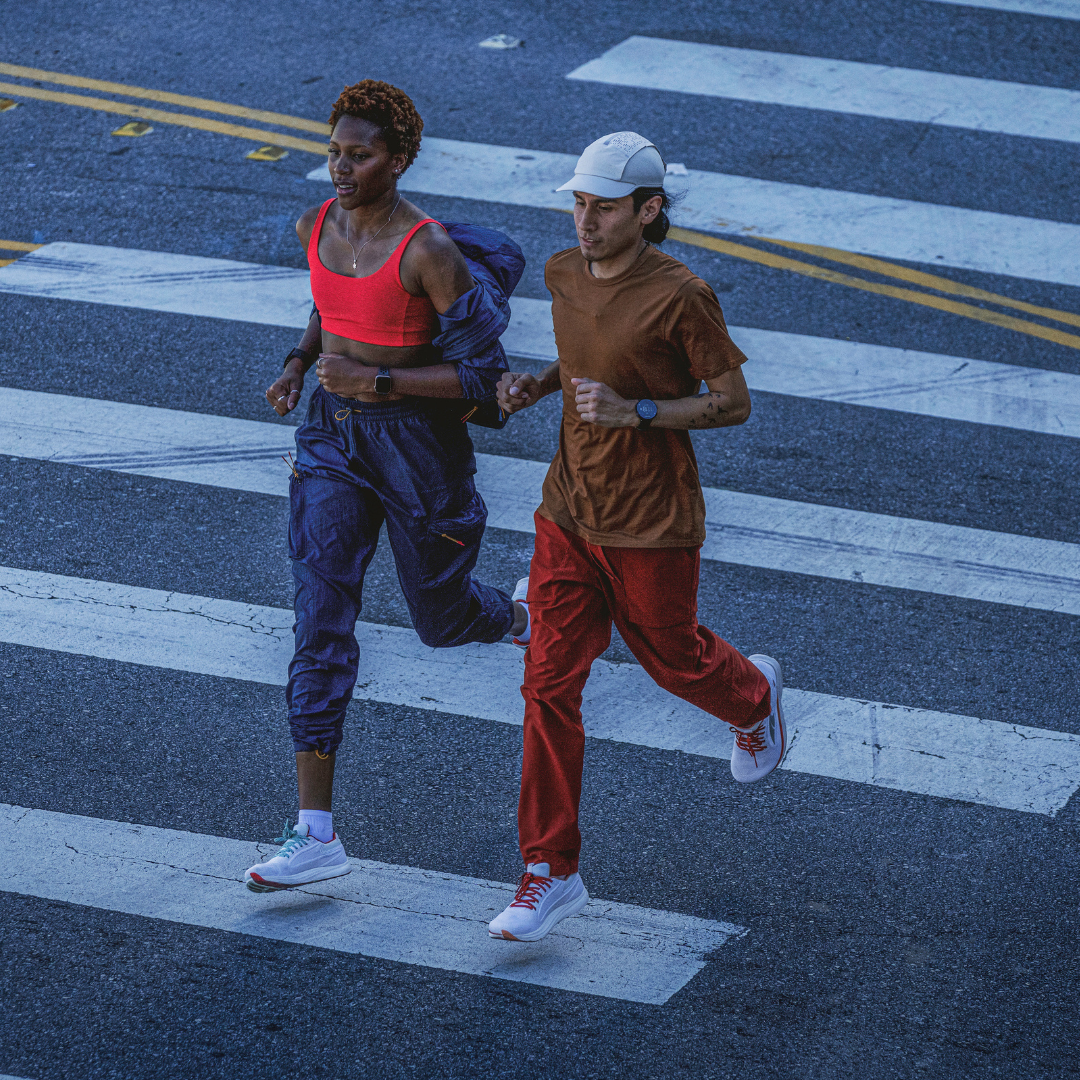 Two runners in crosswalk